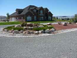 contact us to install a similar driveway island landscaping